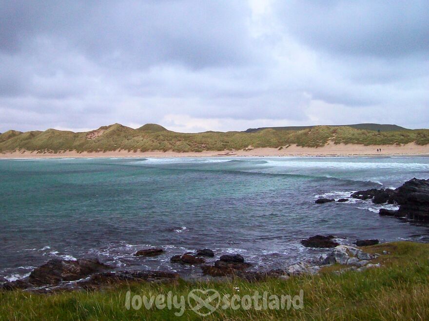 Balnakeil Beach in Durness with turquoise water dunes and rocky shore