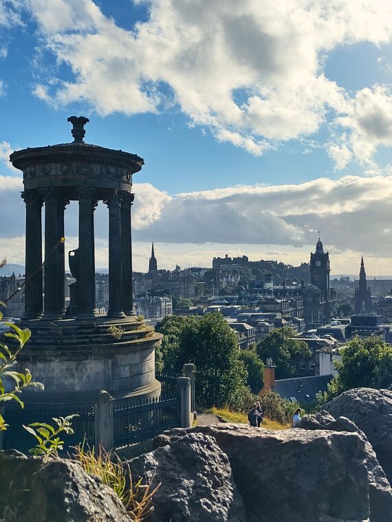 Edinburgh skyline from Calton Hill with Edinburgh Castle in the distance